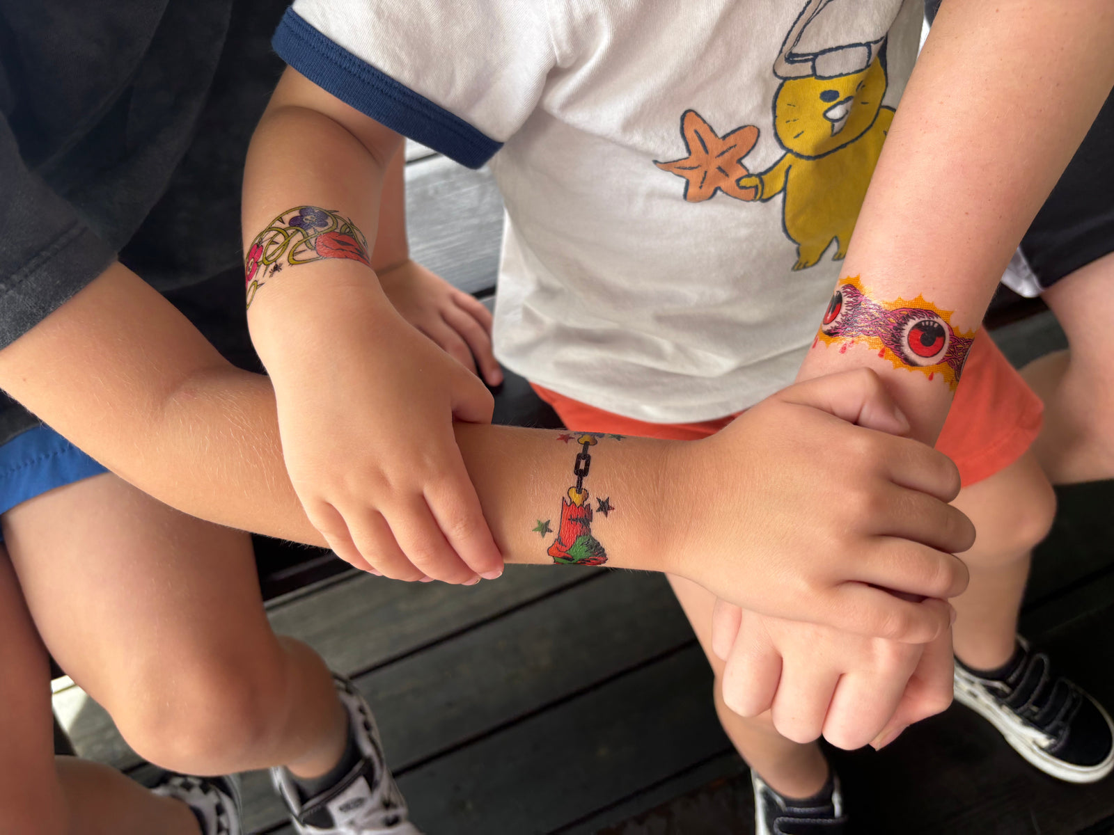 temporary tattoo sleeve for kids colorful tattoo designs covering the full arm used for parties and group events