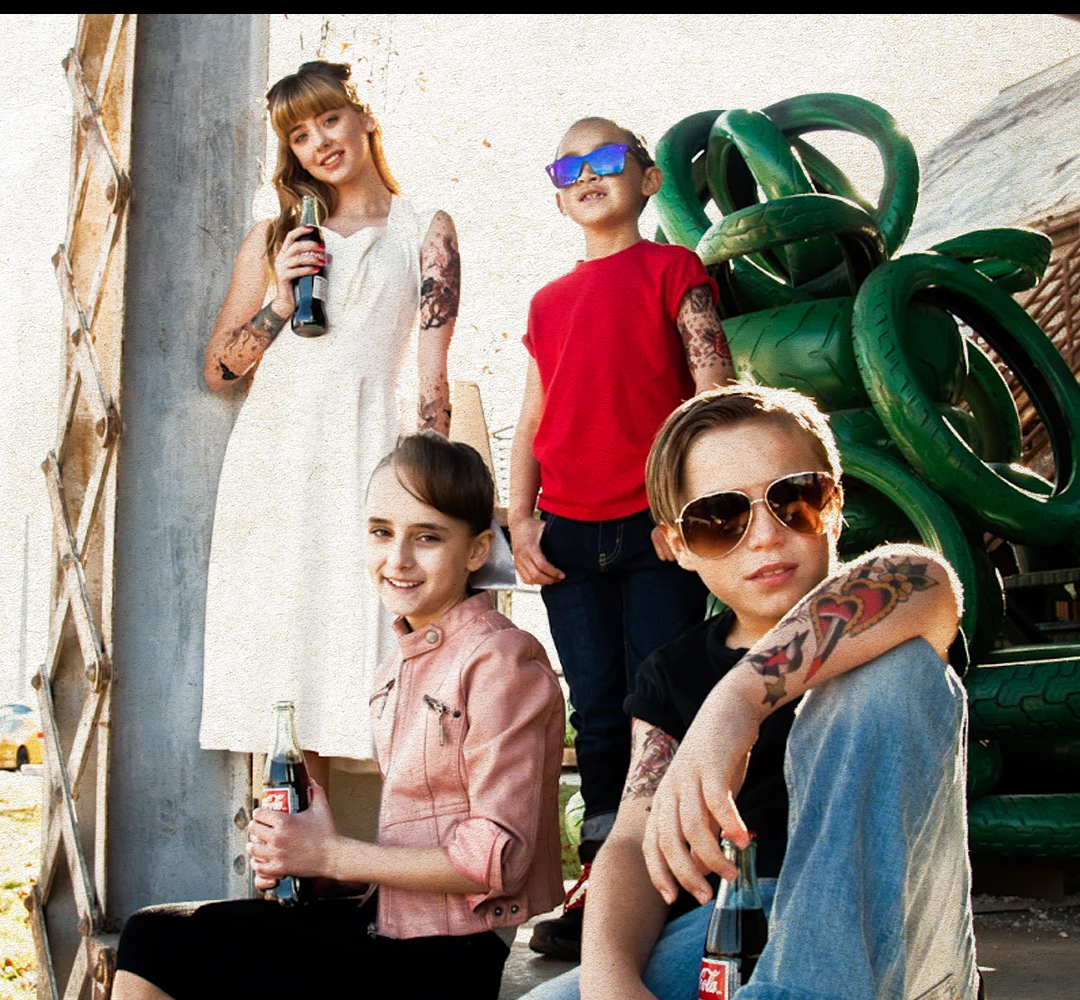 temporary tattoo sleeve for kids with colorful illustrated tattoo designs covering the full arm in a realistic kids temporary tattoo sleeve style