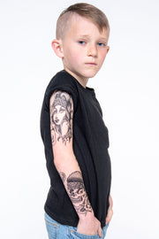 Mexican-American Chicano tattoo sleeve on little boy.