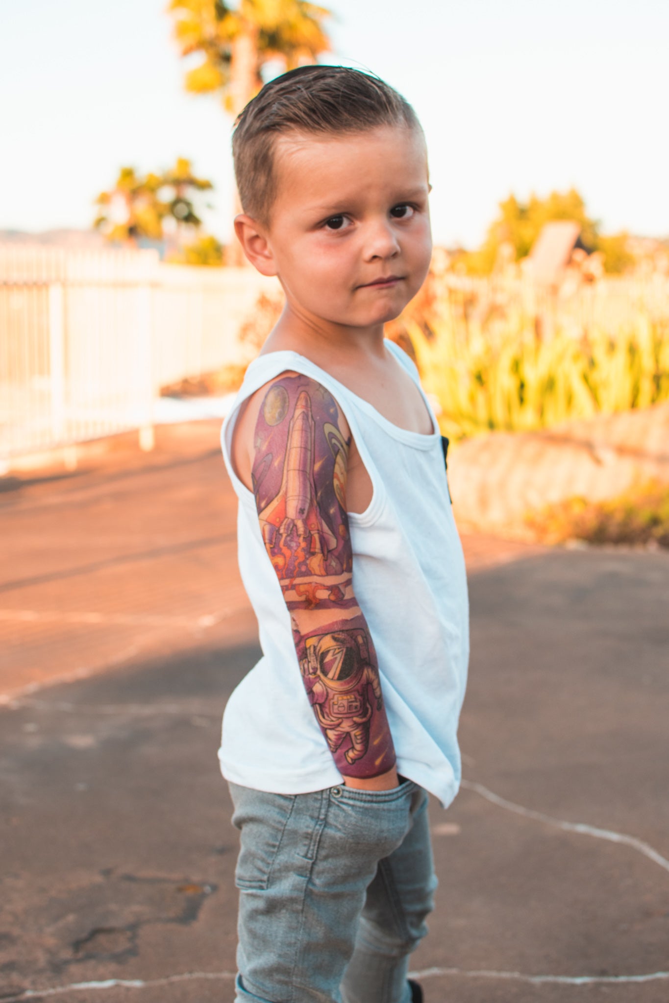 Cosmic Cruiser Full Sleeve Tattoo - alien astronaut boy explore flying saucer full sleeve Kate Shevtsova neo-traditional Rocket space spaceship full sleeve temporary tattoo for kids